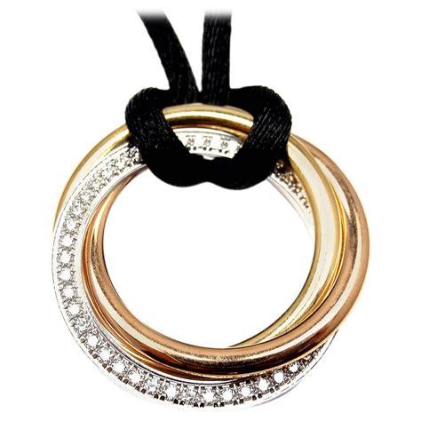 cartier trinity necklace with diamonds.